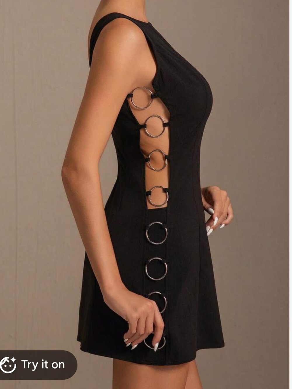 Sleek Black Sleeveless Mini Dress with Side Buckle Accents